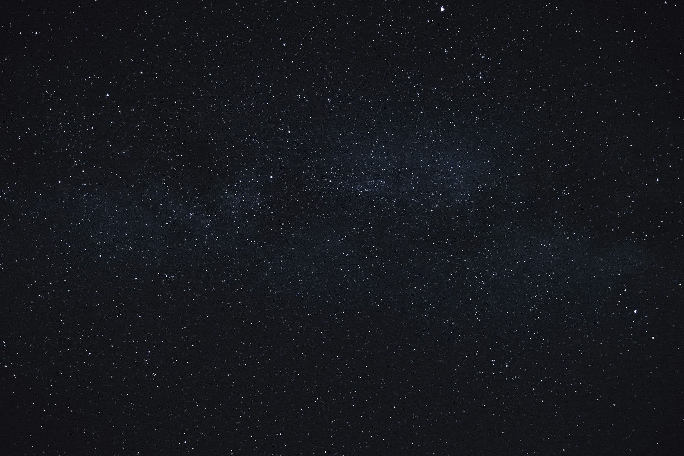 A dense star field on black